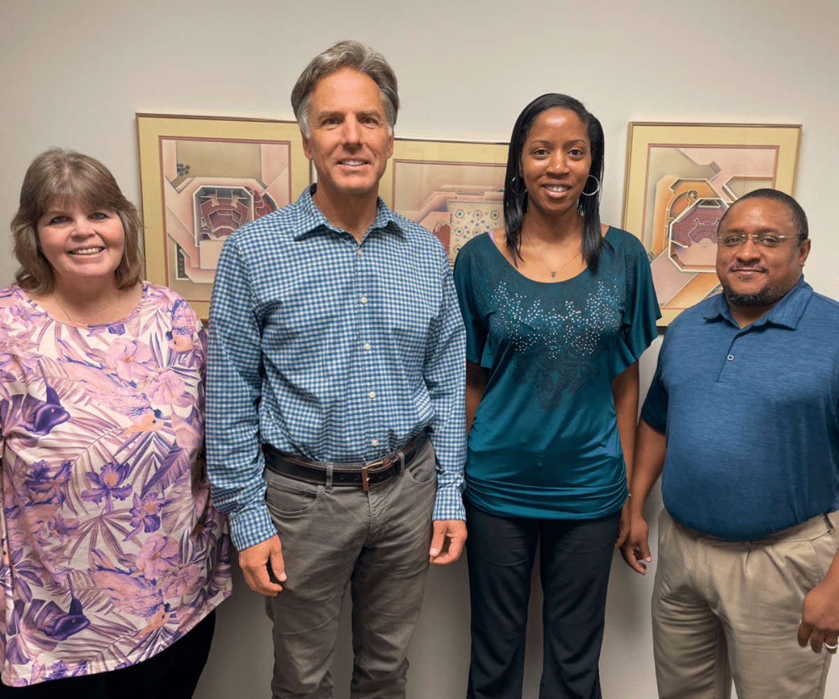 a group of people posing for a photo