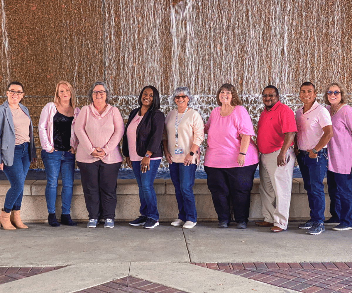 a group of people posing for a photo