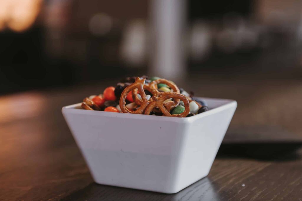 A Plate Of Food Sitting On Top Of A Wooden Table